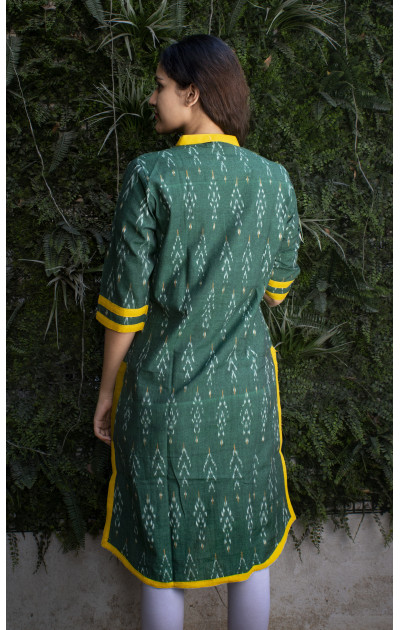 Green ikkat dress with yellow patch below neck