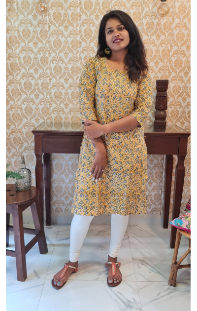 Yellow  cambric  kurti floral print with pin tucks 