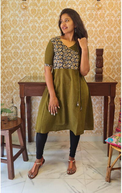 Yellowish green  kurti with black & white patch