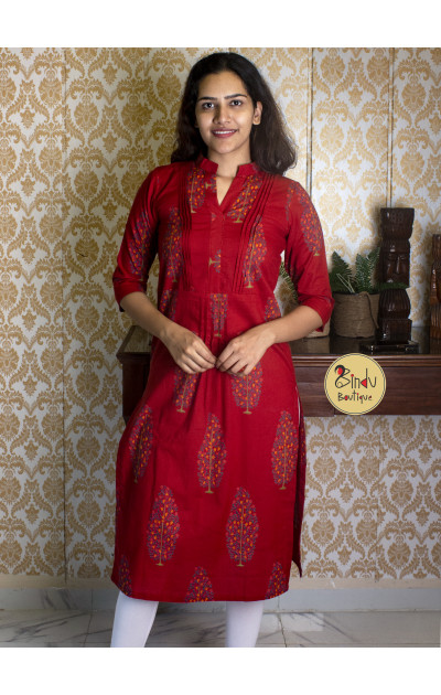 Maroon Kurtis with mughal motifs and pintask on the yoke portion