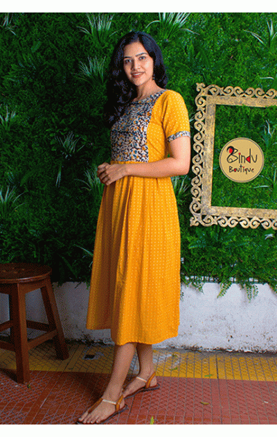 Yellow dress with brown kalamkari patch