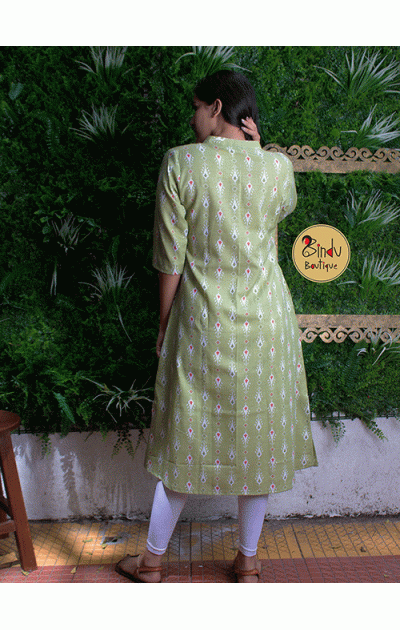 Pista green coloured kurti with black colored lace