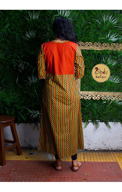 Orange & Green colored dress with zigzag print